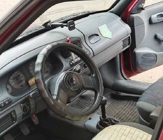 Красный Шкода Фелиция, объемом двигателя 1.3 л и пробегом 402 тыс. км за 1183 $, фото 1 на Automoto.ua