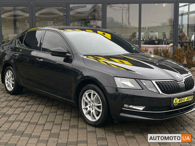 Черный Шкода Octavia A7, объемом двигателя 1.6 л и пробегом 225 тыс. км за 14500 $, фото 1 на Automoto.ua