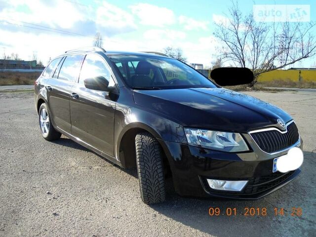 Черный Шкода Octavia A7, объемом двигателя 1.6 л и пробегом 131 тыс. км за 13950 $, фото 1 на Automoto.ua