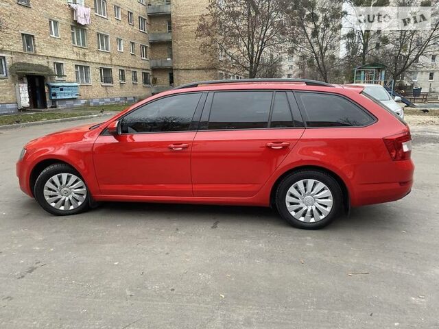 Красный Шкода Octavia A7, объемом двигателя 2 л и пробегом 213 тыс. км за 12500 $, фото 1 на Automoto.ua