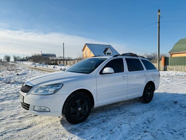 Білий Шкода Octavia Scout, об'ємом двигуна 1.8 л та пробігом 145 тис. км за 10800 $, фото 1 на Automoto.ua