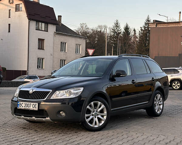 Черный Шкода Октавия Скаут, объемом двигателя 1.97 л и пробегом 210 тыс. км за 10800 $, фото 1 на Automoto.ua