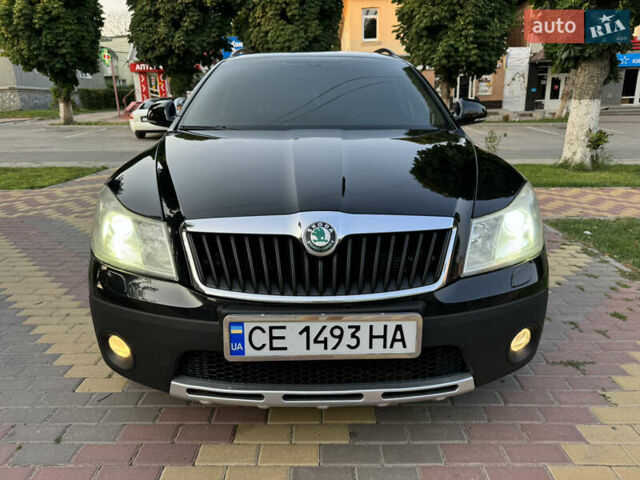 Черный Шкода Октавия Скаут, объемом двигателя 2 л и пробегом 305 тыс. км за 10999 $, фото 1 на Automoto.ua