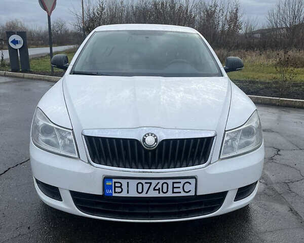 Белый Шкода Октавия, объемом двигателя 1.4 л и пробегом 164 тыс. км за 7400 $, фото 1 на Automoto.ua