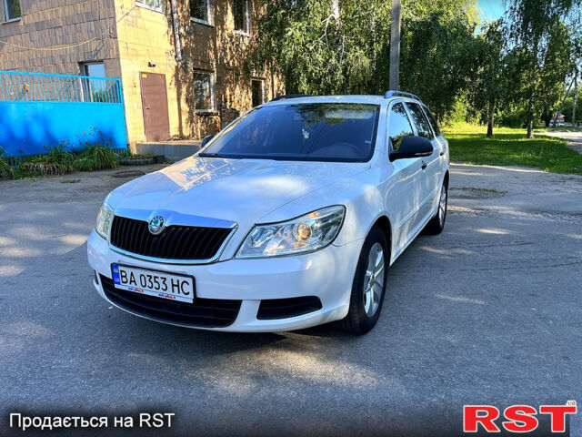 Белый Шкода Октавия, объемом двигателя 1.4 л и пробегом 210 тыс. км за 6900 $, фото 1 на Automoto.ua