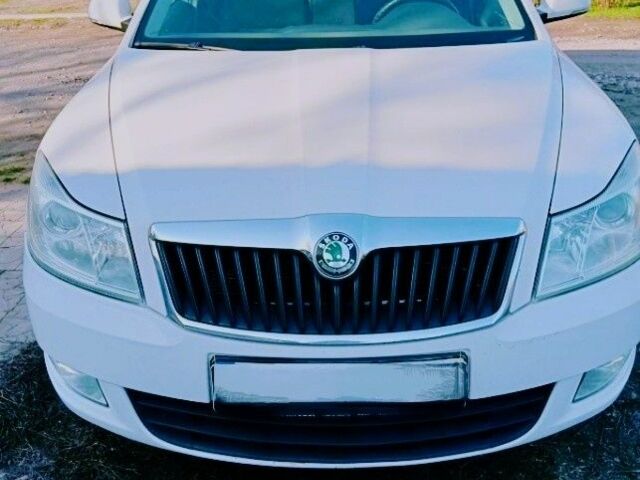 Білий Шкода Октавія, об'ємом двигуна 1.2 л та пробігом 280 тис. км за 5500 $, фото 1 на Automoto.ua