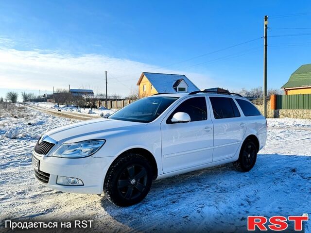 Білий Шкода Октавія, об'ємом двигуна 1.8 л та пробігом 147 тис. км за 8300 $, фото 1 на Automoto.ua