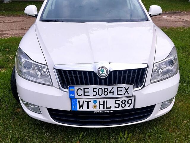 Белый Шкода Октавия, объемом двигателя 1.6 л и пробегом 28400 тыс. км за 10450 $, фото 1 на Automoto.ua