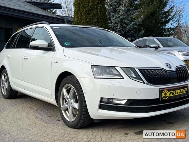 Білий Шкода Октавія, об'ємом двигуна 2 л та пробігом 220 тис. км за 21999 $, фото 1 на Automoto.ua