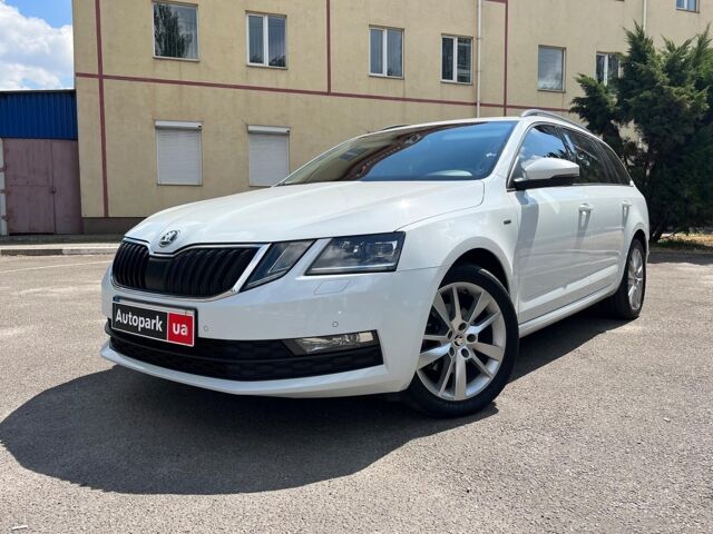 Белый Шкода Октавия, объемом двигателя 2 л и пробегом 209 тыс. км за 16990 $, фото 1 на Automoto.ua