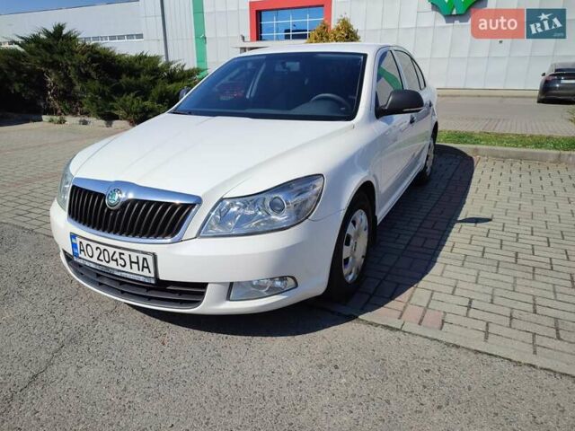 Білий Шкода Октавія, об'ємом двигуна 1.4 л та пробігом 211 тис. км за 7200 $, фото 1 на Automoto.ua