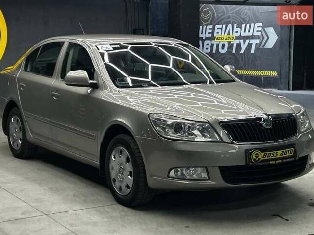 Бежевий Шкода Октавія, об'ємом двигуна 1.8 л та пробігом 245 тис. км за 6600 $, фото 1 на Automoto.ua