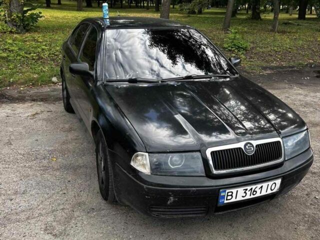 Черный Шкода Октавия, объемом двигателя 1.6 л и пробегом 333 тыс. км за 2202 $, фото 1 на Automoto.ua
