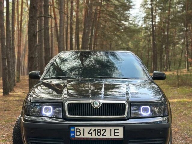 Черный Шкода Октавия, объемом двигателя 2 л и пробегом 423 тыс. км за 5200 $, фото 1 на Automoto.ua