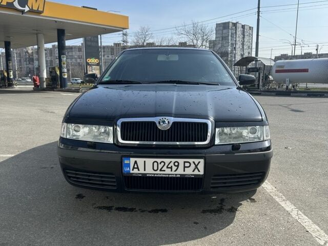 Черный Шкода Октавия, объемом двигателя 1.6 л и пробегом 148 тыс. км за 5500 $, фото 1 на Automoto.ua