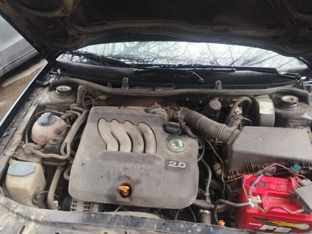 Черный Шкода Октавия, объемом двигателя 2 л и пробегом 365 тыс. км за 4147 $, фото 1 на Automoto.ua