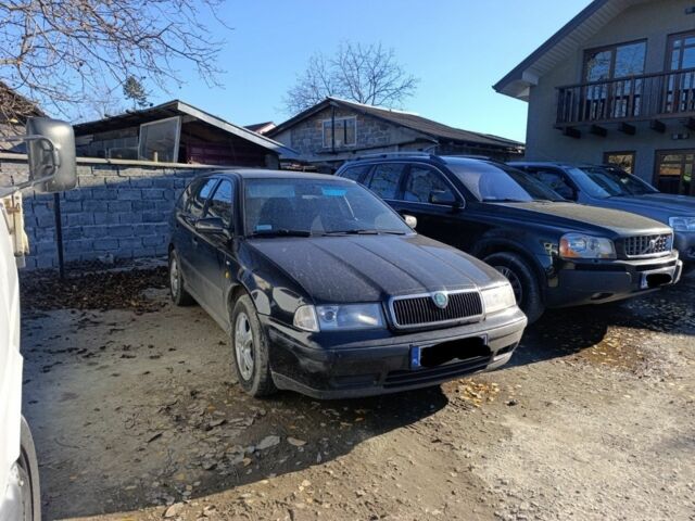 Чорний Шкода Октавія, об'ємом двигуна 2 л та пробігом 320 тис. км за 2000 $, фото 1 на Automoto.ua