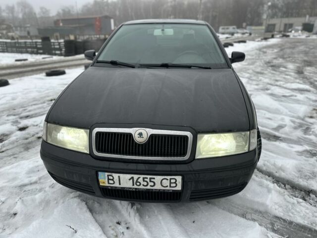Черный Шкода Октавия, объемом двигателя 1.6 л и пробегом 225 тыс. км за 3600 $, фото 1 на Automoto.ua