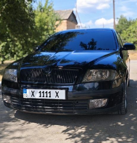 Чорний Шкода Октавія, об'ємом двигуна 2 л та пробігом 256 тис. км за 6550 $, фото 1 на Automoto.ua