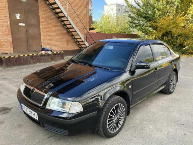 Чорний Шкода Октавія, об'ємом двигуна 1.6 л та пробігом 268 тис. км за 7200 $, фото 1 на Automoto.ua