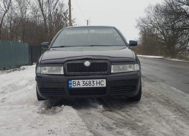 Чорний Шкода Октавія, об'ємом двигуна 1.8 л та пробігом 235 тис. км за 4200 $, фото 1 на Automoto.ua