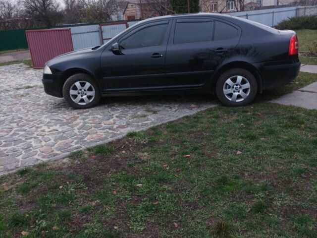 Черный Шкода Октавия, объемом двигателя 2 л и пробегом 230 тыс. км за 6200 $, фото 1 на Automoto.ua