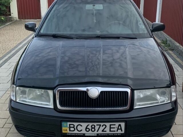 Черный Шкода Октавия, объемом двигателя 1.6 л и пробегом 304 тыс. км за 4600 $, фото 1 на Automoto.ua