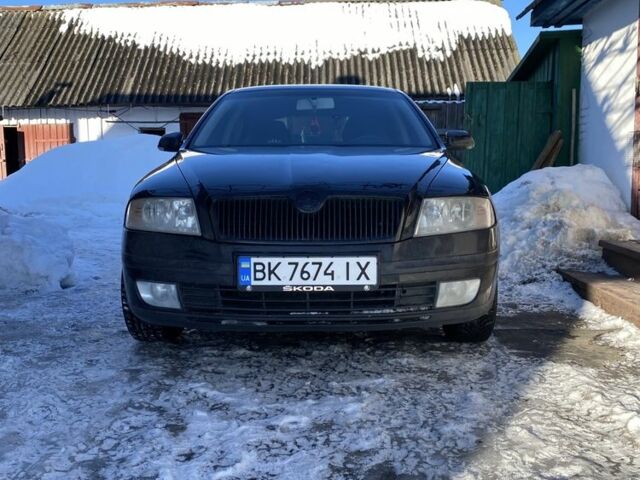 Черный Шкода Октавия, объемом двигателя 1.6 л и пробегом 184 тыс. км за 5500 $, фото 1 на Automoto.ua