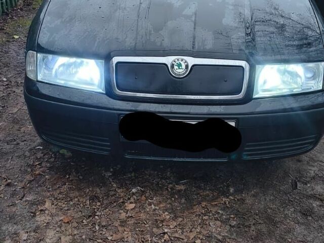 Черный Шкода Октавия, объемом двигателя 1.6 л и пробегом 172 тыс. км за 5600 $, фото 1 на Automoto.ua