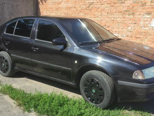 Черный Шкода Октавия, объемом двигателя 1.6 л и пробегом 279 тыс. км за 4900 $, фото 1 на Automoto.ua