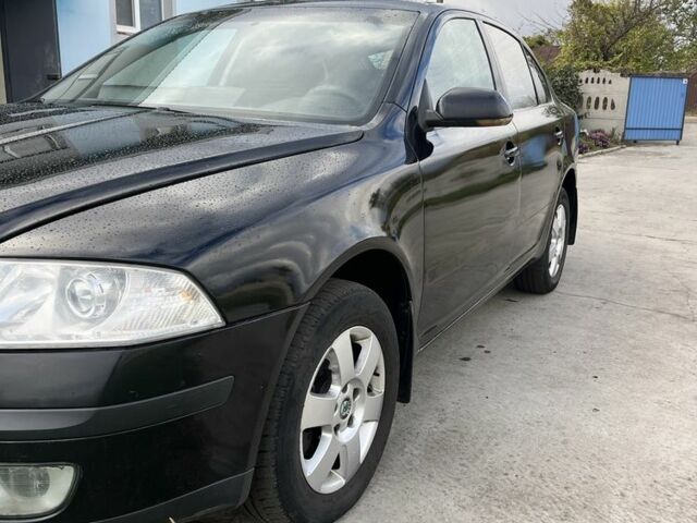 Черный Шкода Октавия, объемом двигателя 2 л и пробегом 330 тыс. км за 4250 $, фото 1 на Automoto.ua