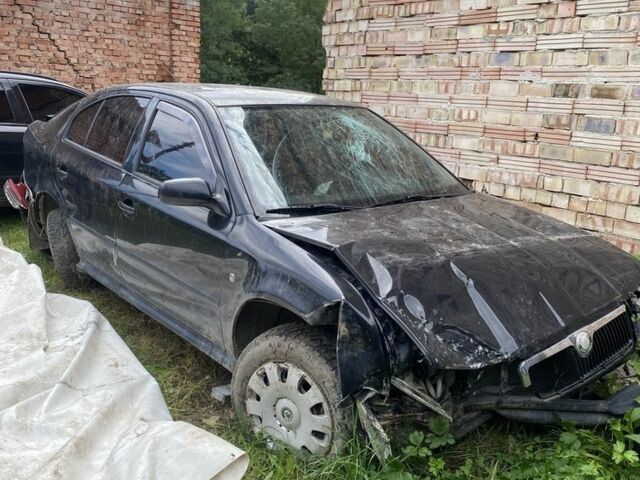 Черный Шкода Октавия, объемом двигателя 9 л и пробегом 215 тыс. км за 1599 $, фото 1 на Automoto.ua