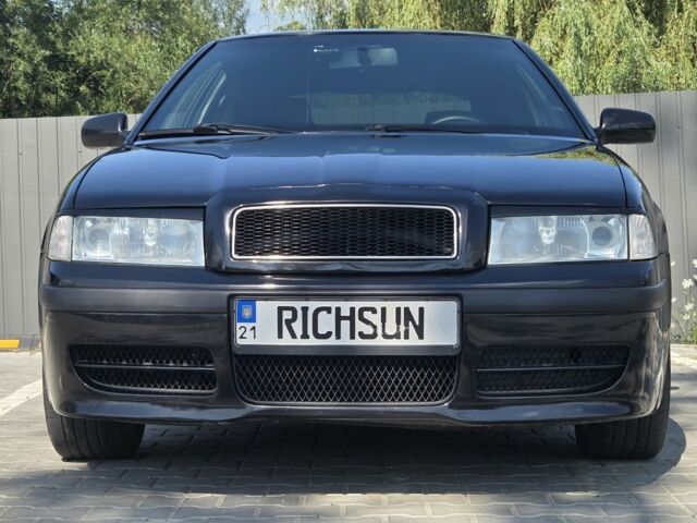 Черный Шкода Октавия, объемом двигателя 1.8 л и пробегом 225 тыс. км за 6000 $, фото 1 на Automoto.ua