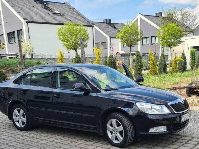 Черный Шкода Октавия, объемом двигателя 2 л и пробегом 228 тыс. км за 7000 $, фото 1 на Automoto.ua