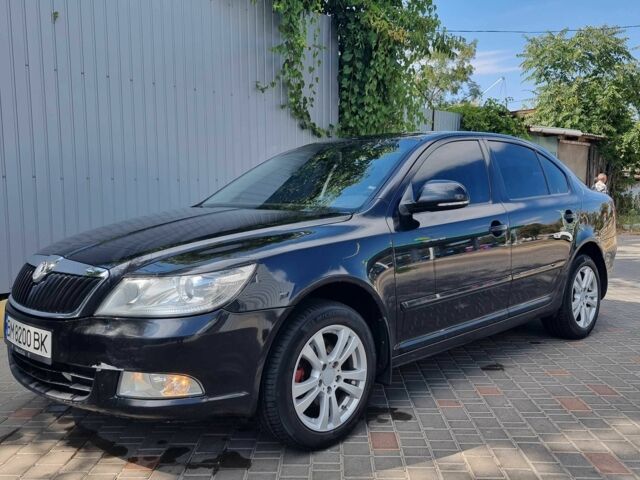 Черный Шкода Октавия, объемом двигателя 1.6 л и пробегом 174 тыс. км за 7417 $, фото 1 на Automoto.ua