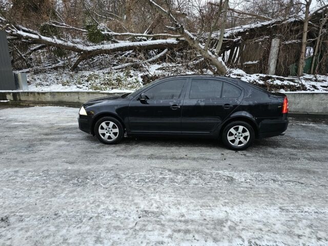 Черный Шкода Октавия, объемом двигателя 1.6 л и пробегом 193 тыс. км за 6500 $, фото 1 на Automoto.ua
