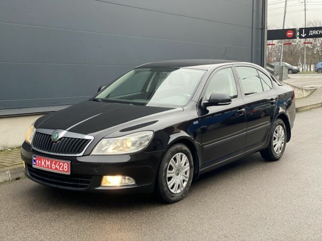Чорний Шкода Октавія, об'ємом двигуна 1.6 л та пробігом 183 тис. км за 7999 $, фото 1 на Automoto.ua