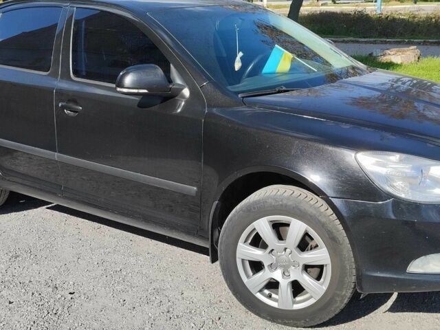 Чорний Шкода Октавія, об'ємом двигуна 1.8 л та пробігом 495 тис. км за 7537 $, фото 1 на Automoto.ua
