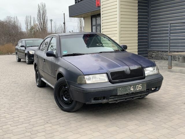 Черный Шкода Октавия, объемом двигателя 1.8 л и пробегом 300 тыс. км за 1250 $, фото 1 на Automoto.ua