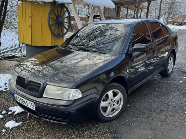 Черный Шкода Октавия, объемом двигателя 1.8 л и пробегом 321 тыс. км за 3500 $, фото 1 на Automoto.ua