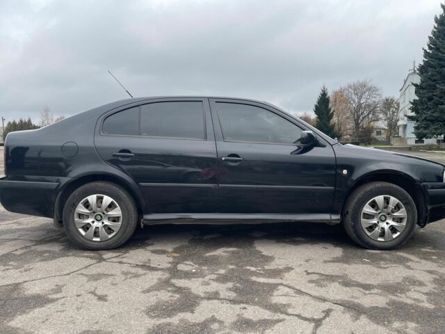 Черный Шкода Октавия, объемом двигателя 1.6 л и пробегом 204 тыс. км за 5000 $, фото 1 на Automoto.ua