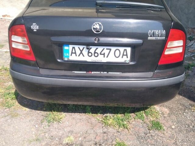 Черный Шкода Октавия, объемом двигателя 1.6 л и пробегом 320 тыс. км за 5400 $, фото 1 на Automoto.ua