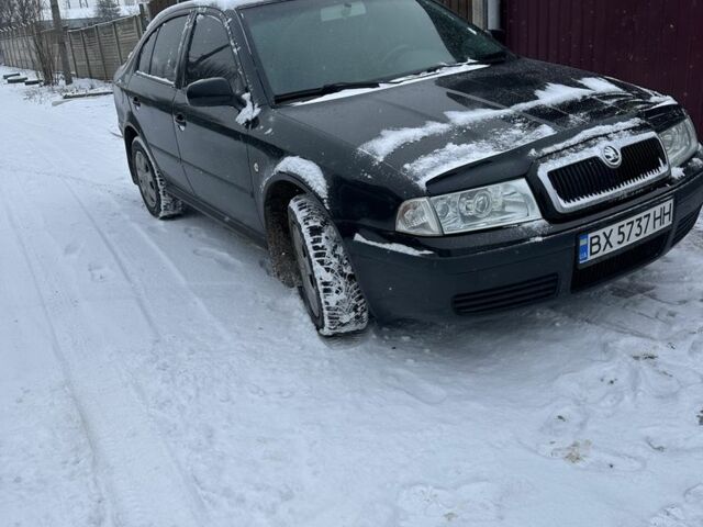 Черный Шкода Октавия, объемом двигателя 1.6 л и пробегом 244 тыс. км за 5250 $, фото 1 на Automoto.ua