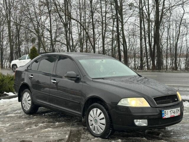 Черный Шкода Октавия, объемом двигателя 2 л и пробегом 220 тыс. км за 5650 $, фото 1 на Automoto.ua