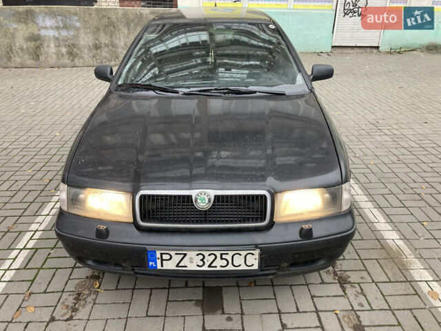 Черный Шкода Октавия, объемом двигателя 1.6 л и пробегом 300 тыс. км за 2500 $, фото 1 на Automoto.ua