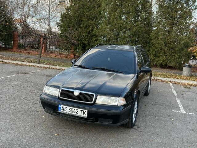 Черный Шкода Октавия, объемом двигателя 1.6 л и пробегом 302 тыс. км за 3900 $, фото 1 на Automoto.ua