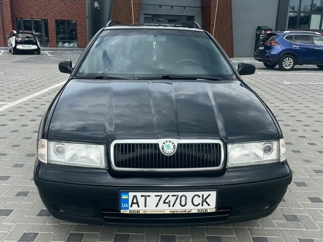 Черный Шкода Октавия, объемом двигателя 1.6 л и пробегом 250 тыс. км за 3700 $, фото 1 на Automoto.ua