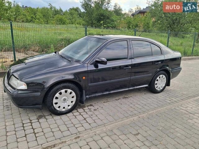 Черный Шкода Октавия, объемом двигателя 1.6 л и пробегом 269 тыс. км за 3200 $, фото 1 на Automoto.ua
