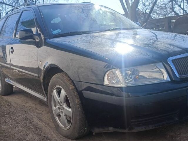 Черный Шкода Октавия, объемом двигателя 2 л и пробегом 390 тыс. км за 1900 $, фото 1 на Automoto.ua