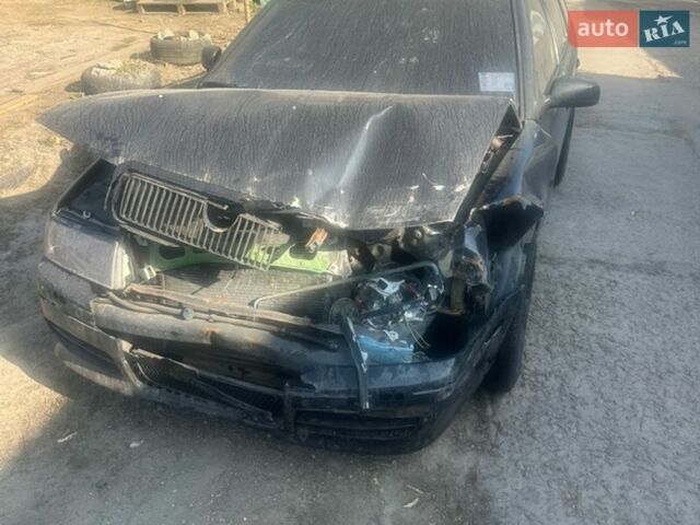 Черный Шкода Октавия, объемом двигателя 1.9 л и пробегом 330 тыс. км за 1900 $, фото 1 на Automoto.ua